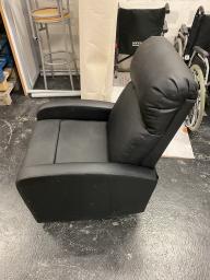 Photo détaillant le don Fauteuil noir