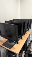 Photo détaillant le don 15 Dell Optiplex 3240 AIO (clavier, souris, câble d’alimentation inclus)