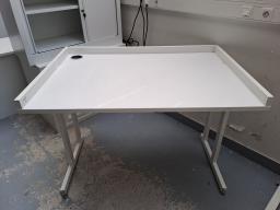 Photo détaillant le don table de travail