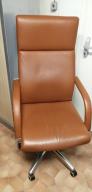 Photo détaillant le don Fauteuil cuir état correct
